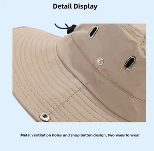 Close-up of metal eyelets and press buttons on a khaki outdoor sun protection hat