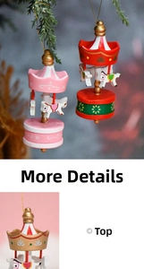 Close-up of hand-painted wooden carousel Christmas ornaments with festive gold details