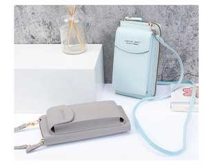 Detail showing light blue and gray crossbody phone wallets with thin shoulder straps