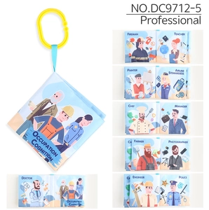 Detailed view of washable baby cloth book with career themes and yellow hanging ring hook