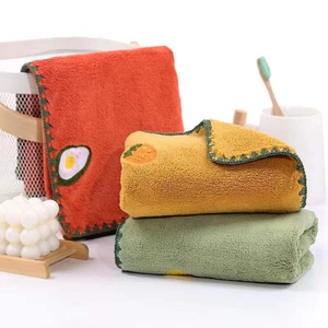 Soft coral fleece towel set with fruit embroidery and decorative wavy crochet edges