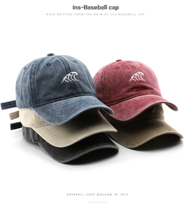 Detailed embroidery of wave pattern on vintage washed cotton baseball caps in various colors