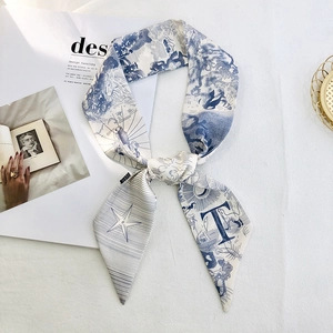 Elegant blue and white silk twilly scarf with alphabet print and starry pattern