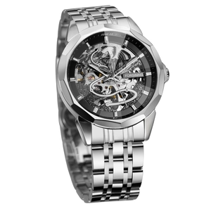 Detailed macro view of silver hollow mechanical watch movement with 3D diamond cut bezel