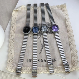 Set of four oval dial ladies watches with silver metal alloy bands in multiple colors