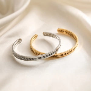 Adjustable 18K gold and silver stainless steel bangles with twisted woven texture