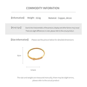 Detailed close-up showing dimensions of the gold-plated zircon flower bangle