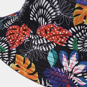 Close-up of tropical leaf print bucket hat showing fine stitching and cotton texture