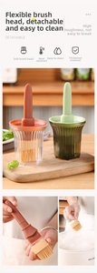 Detailed view of high-temperature resistant silicone oil brush with integrated storage bottle
