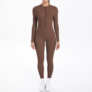 Detail of coffee brown long sleeve sports bodysuit with front zipper and stand collar