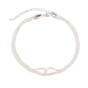 Detail of silver multi-layer layered chain necklace with lobster clasp on white background