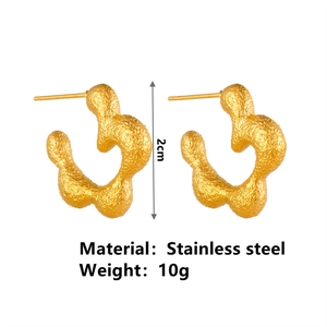 Irregular gold flower stud earrings in stainless steel with a textured half-open design