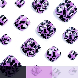 Glossy purple leopard print press-on toenails with assorted sizes on white background