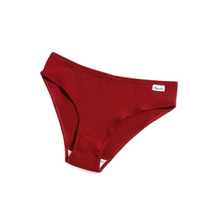 Flat lay of dark red ribbed cotton women's panties with breathable double-layer crotch