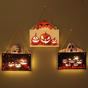 Halloween LED wall decor set featuring glowing pumpkin, ghost, and mummy motifs