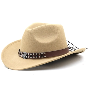 Detail of khaki felt cowboy hat featuring silver rivets and a retro metallic emblem
