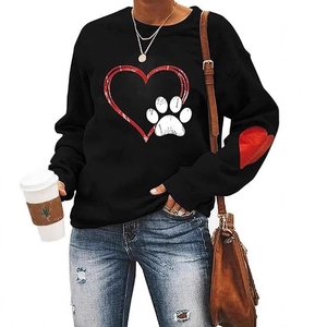 Women's black long sleeve sweatshirt featuring a red heart and white paw print design