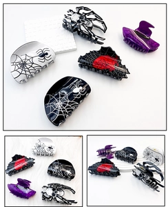 Detailed set of Halloween hair claws featuring spooky spiders, webs and witch hat designs