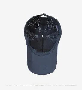 Detail view of breathable laser-cut holes and mesh lining inside the navy baseball cap