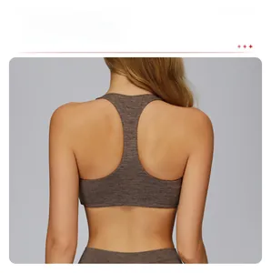 Close-up of racerback detail on dark gray brushed yoga bra for high support