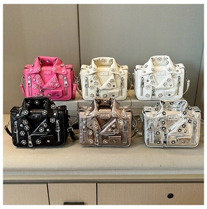 Multiple colors of biker jacket style crossbody bags with metallic floral 3D decorations