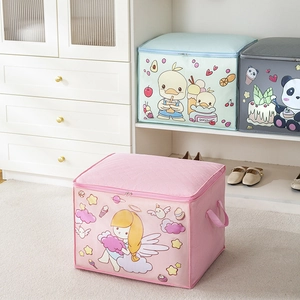 Detail of cartoon printed large storage bags in pink, blue, and grey for clothing organization
