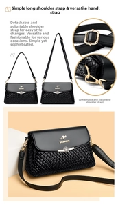 Detail of black woven shoulder bag with floral metal clasp and adjustable strap