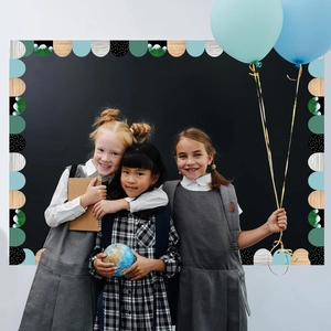 Detailed scalloped border stickers for classroom bulletin boards featuring students