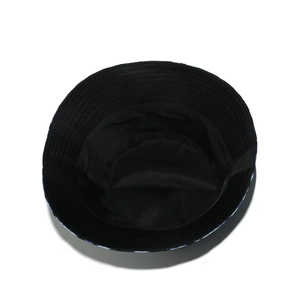 Interior view showing the high-quality lining and stitching of the black bucket hat.
