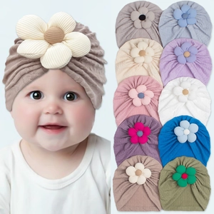 Soft baby striped turban hat with a large decorative flower available in various colors
