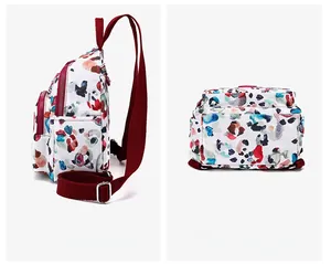 Detail view of mini floral nylon backpack showing side pockets and red adjustable straps