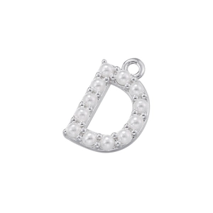 Detailed macro view of 18K gold plated letter D pendant with small white pearls