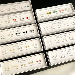 Chic 5-pair weekly stud earring set in gold-tone gift box with varied trendy motifs