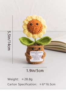 Detail shot of hand-knitted sunflower plant with 14cm height and 5cm base width specs