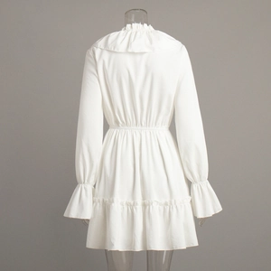 Rear view of white V-neck chiffon mini dress featuring tiered ruffle layers and flared sleeves
