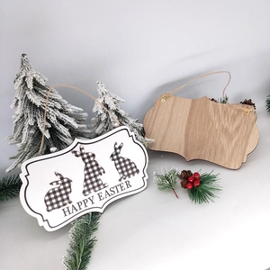 Wooden Happy Easter hanging signs with rabbit silhouettes and pine branch decoration