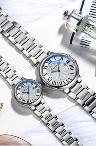 Detail of Chenxi couple watches with stainless steel bands, roman numerals and date windows