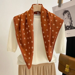Elegant rust red floral silk scarf with white leaf patterns for autumn fashion