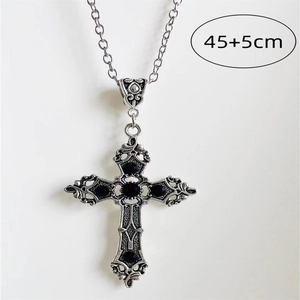 Detail of gothic cross necklace with black gemstones and 45+5cm length parameter