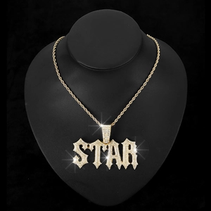 Hip hop style gold plated STAR pendant necklace with sparkling crystals on black bust