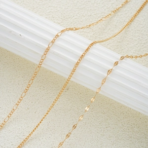 Three-piece set of elegant gold-tone waist chains with sequins and layered metal links