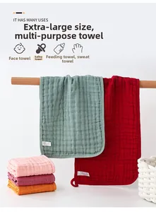 Macro detail of multi-layer pure cotton muslin baby towels with soft bubble gauze texture
