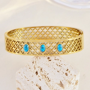 Bohemian gold stainless steel wide cuff bracelet with oval turquoise and hollow patterns