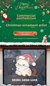 Detail of Christmas white cat window sticker featuring Bring Good Luck slogan text