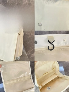 Detail view of cream travel toiletry bag with hanging hook and mesh compartments