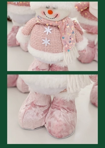 Detail showing pink sequin scarf, snowflake embroidery and velvet boots of snowman doll