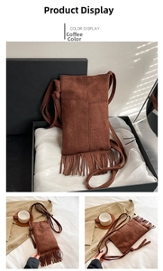 Detail of coffee brown suede crossbody bag with long fringes and bohemian aesthetic