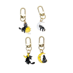 Set of 4 punk black cat keychains with celestial moon and sun charms in gold metal finish