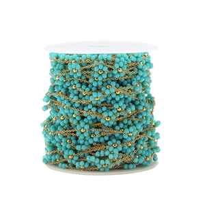 Detail of turquoise beads with 1.5mm gold plated stainless steel weaving flower chain