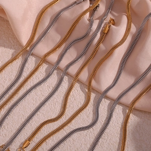 Detailed close-up of 3mm foxtail chains in gold and silver steel finishes